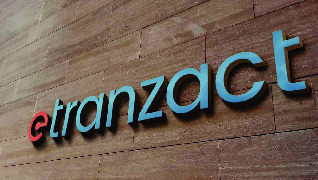 Who is the new majority owner of eTranzact?